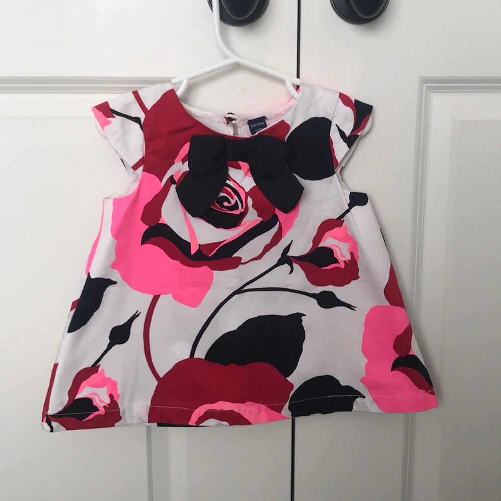 Baby gap floral top with big satin bow. Like new.